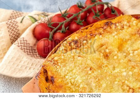 Traditional Italian Cannelloni With Vegetables, Minced Meat And Cheese. On A Wooden Background. Top 