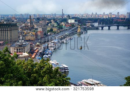 Kyiv, Ukraine - July 14, 2019. View Of The Dnipro Embankment, River Station, Poshtova Square, Grand 