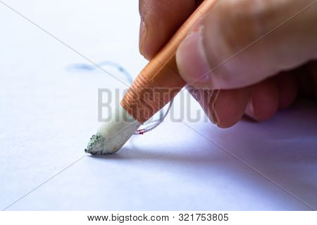 Woman's Right Hand Holding Dermatograph Pencil Writing Letter On White Paper Texture Background, Not