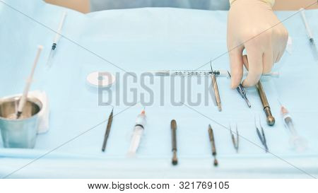 Ophthalmology Laser Microscope Operation. Clinic Room With Doctor And Parient. Gloves And Medicine T