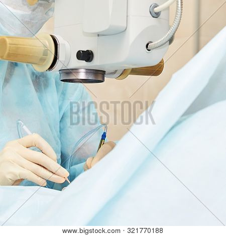 Ophthalmology Laser Microscope Operation. Doctor In Clinic. Patient Eye Treatment. Myopia And Catara