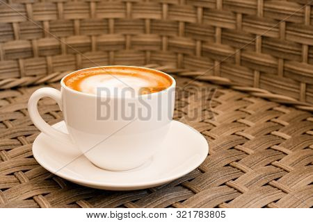 Cappuccino In White Cup On Wood Table Background At Cafe. Place For Text. Bewerages, Coffee Lovers A