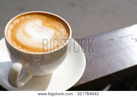Cappuccino In White Cup On Sunlight At Cafe. Copyspace. Bewerages, Coffee Lovers And Morning Menu Co