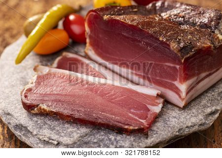 Closeup Of South Tyrolean Speck On Granite