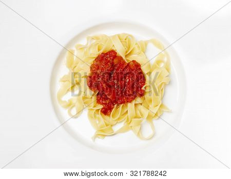 Italian Tagliatella Pasta With Tomato Sauce On White