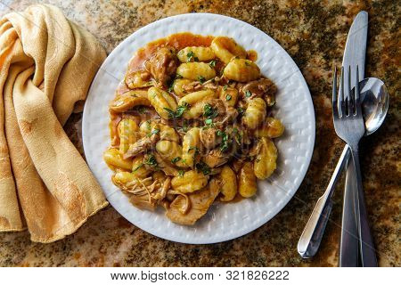 Hungarian Chicken Paprikash With Gnocchi Potato Dumplings And Basil