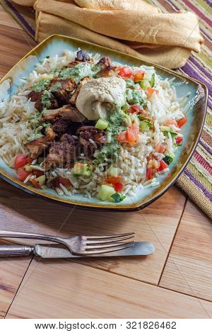 Authentic Middle Eastern Chicken Shawarma Rice Platter With Hummus And Side Salad