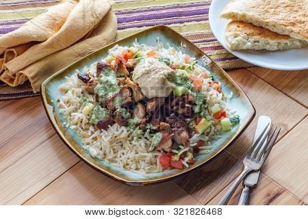 Authentic Middle Eastern Chicken Shawarma Rice Platter With Hummus And Side Salad