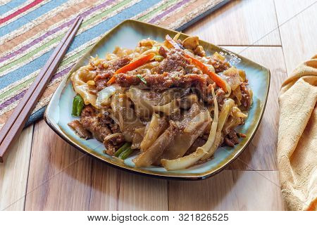 Stir Fried Chinese Beef Chow Fun With Hor Fun Wide Rice Noodles Cabbage And Carrots