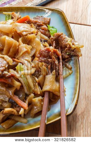 Stir Fried Chinese Beef Chow Fun With Hor Fun Wide Rice Noodles Cabbage And Carrots