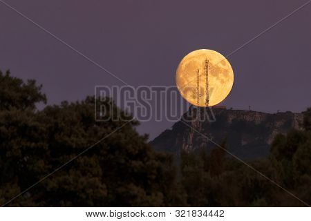 Full Moon Crossing Two Antennas In Vitoria, Alava