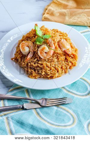 Tail-on Shrimp Spanish Rice With Vermicelli Pasta On Marble Kitchen Table