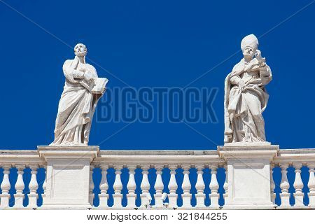 Detail Of The Statues Of Saints That Crown The Colonnades Of St. Peter Square Built On 1667 On The V