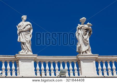 Detail Of The Statues Of Saints That Crown The Colonnades Of St. Peter Square Built On 1667 On The V