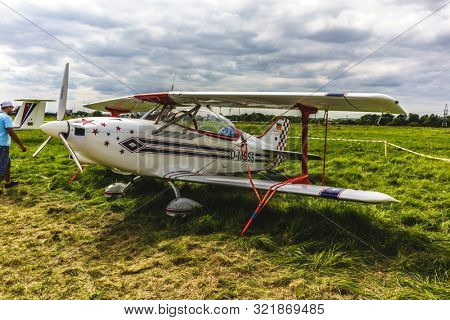 KALININGRAD, Russia - August 18, 2019: 100 Anniversary First European Airport Devau Fest, Ultra Light Propeller Screw Plane Ready for Flight