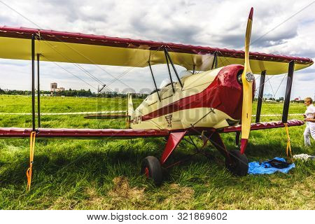 KALININGRAD, Russia - August 18, 2019: 100 Anniversary First European Airport Devau Fest, Ultra Light Propeller Screw Plane Ready for Flight
