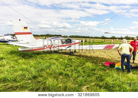 KALININGRAD, Russia - August 18, 2019: 100 Anniversary First European Airport Devau Fest, Ultra Light Propeller Screw Plane Ready for Flight