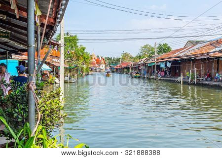 Amphawa Floating Market With Traditional Mae Klong River Side Village Around More Than 500 Years Can