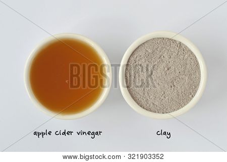 Homemade Face Mask Made Out Of Apple Cider Vinegar And Clay On White Background