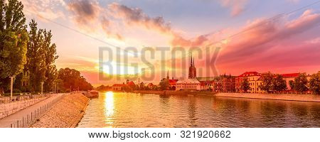 Wroclaw, Poland Sunset Panoramic Banner With Ostrow Tumski Island, Odra Or Oder River And Cathedral 