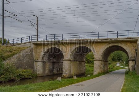 Railway Bridge With Three Arches, Two For The River Of The Tone And One For The Tarmaker Road In The