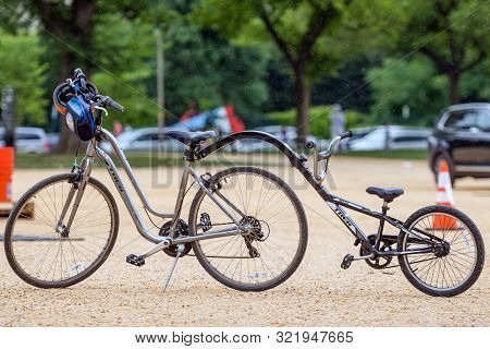 Washington Dc, Usa - June 9, 2019: Family Bike In The Park Near Capitol Building  At Washington Dc