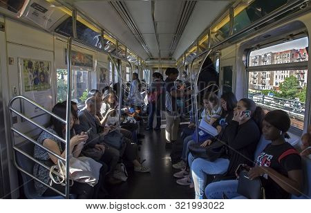 Bronx, New York/usa - May 21, 2019: Passengers Riding Mta Subway Train.