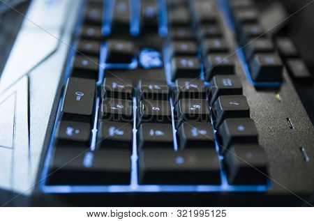 Gamer Keyboard With Colorful Blue Lights, Modern Gamer Computer. Blue Backlight, Backlit On Laptop O