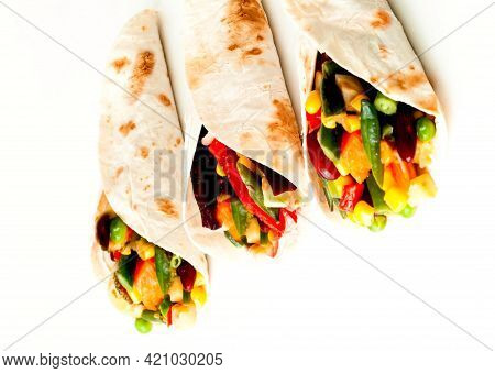 Mexican Tortilla With Vegetable Fillings On White Background. Environmentally Friendly Menu Or Eat L