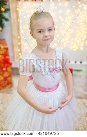 Little ballerina on scene. Children dance ÃÂlassical ballet in studio. .