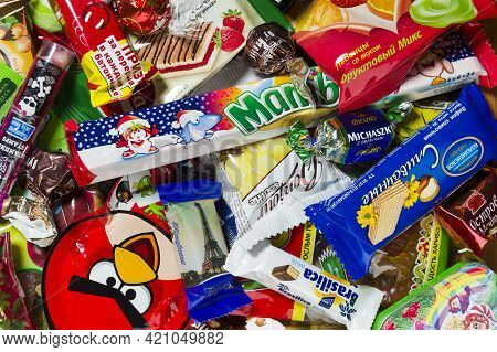 Moscow, Russia - January 02, 2016: Kinder Surprise, Angry Birds, Lindor, Kit Kat, Milky Way, Tempo, 