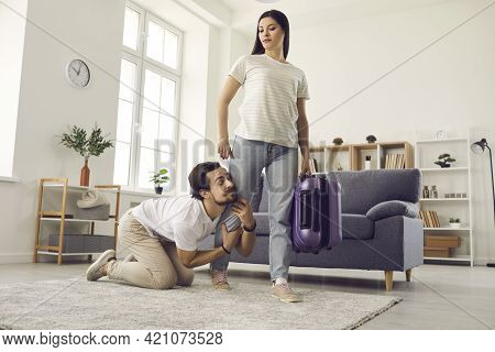 Husband Begging Angry Wife Who Is Leaving Home To Stay And Give Him Second Chance