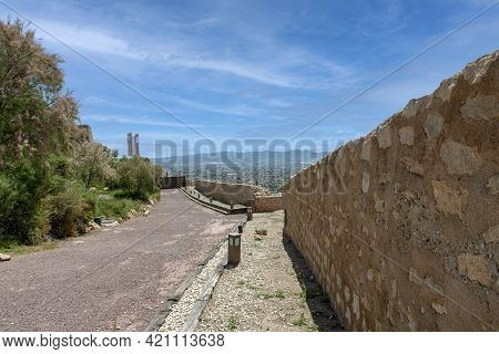 Stone Wall On The Entrance Way To The Medieval Castle Of The City Of Lorca, Murcia, Spain. With Pano