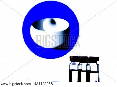 Madrid, Spain- February 20, 2021: Glass Vials With Covid-19 Vaccine And European Medicine Agency Log