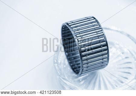 The Needle Bearing Spare Part. The Mechanical Parts Manufacturing Concept.