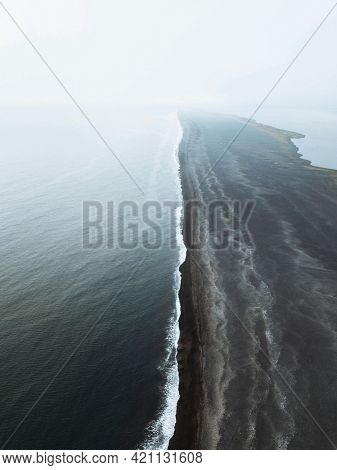 Drone shot of Reynisfjara black sand beach in Iceland