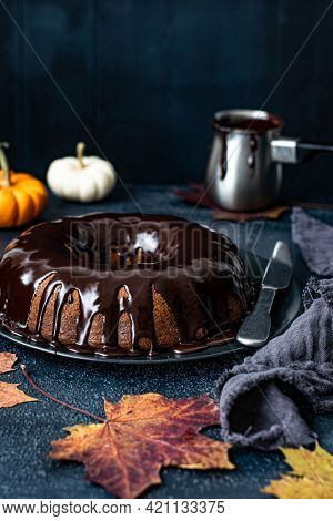 Chocolate covered pumpkin bundt cake