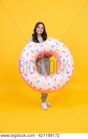 Cheerful Beach Child In Tracksuits With Rubber Ring On Summer Vacation On Yellow Background, Summer.