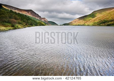 Landscape Over Llyn Cwellyn In Snowdonia National Park Towards Mountains In Distance