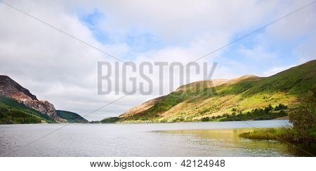 Landscape Over Llyn Cwellyn In Snowdonia National Park Towards Mountains In Distance