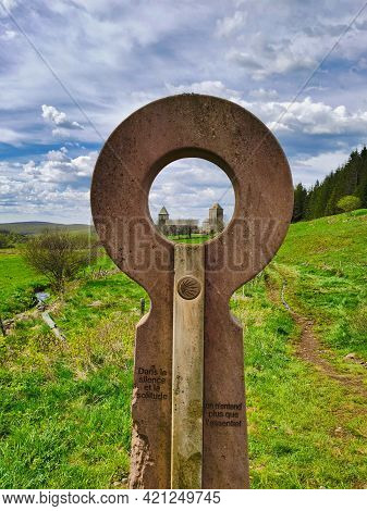 View On The Village Of Aurbrac On The French Part Of The Way Of Saint James. Inscription On The Ston