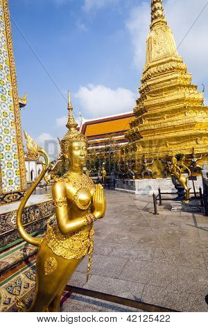 AYUTTHAYA, THAILAND - JAN 5, 2011: a kinaree a mythology figure is watching the temple in the Grand Palace