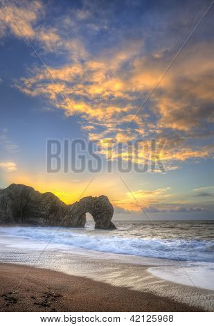 Colourful Winter Sunrises Behind Durdle Door On Jurassic Coast In England