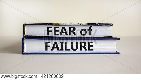 Fear Of Failure Symbol. Books With Words 'fear Of Failure'. Beautiful White Background, Copy Space. 