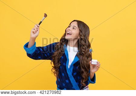 Happy Kid Girl In Sleepwear Using Cosmetic Brush And Powder Foundation, Skin Care