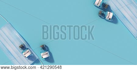 Vial Of Covid - 19 Vaccine And Mask On Blue Background, 3d Rendering