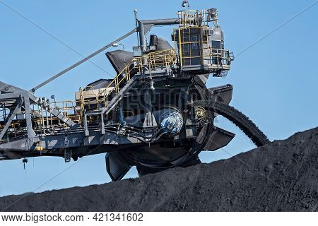 Mackay, Queensland, Australia - May 2021: Monster Machinery Moving Coal At Dalrymple Bay Coal Termin