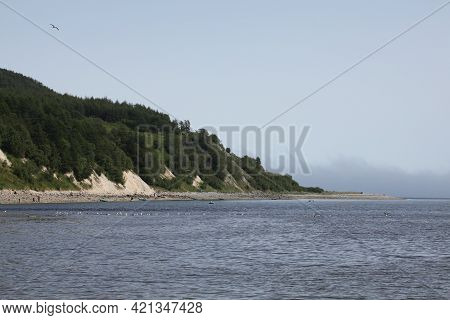 recreation and fishing on the shore of the cold sea