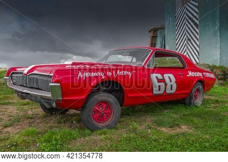 Saint Petersburg, Russia - Sep 04, 2016: Red Retro Car Mercury Cougar Gt-e (1968) Against The Backgr