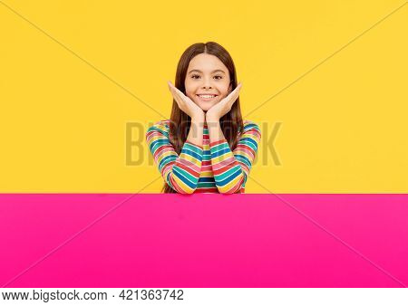 Happy Kid Girl Behind Pink Paper Sheet With Copy Space, Information